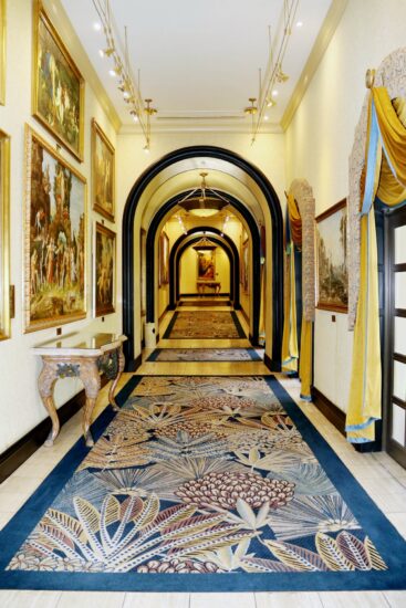 Art-lined arched corridor at the D'oreale Grande, Emperors Palace