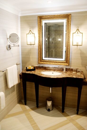 Superior room bathroom with marble vanity at the D'oreale Grande