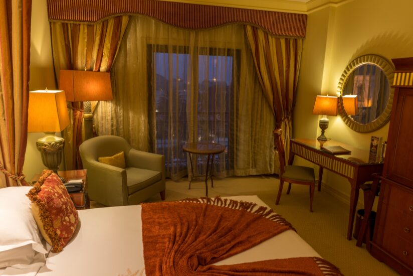 Classic King room with armchair and desk at the D'oreale Grande