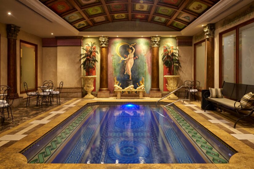 Indoor heated pool with classical mural at the D'oreale Grande, Emperors Palace