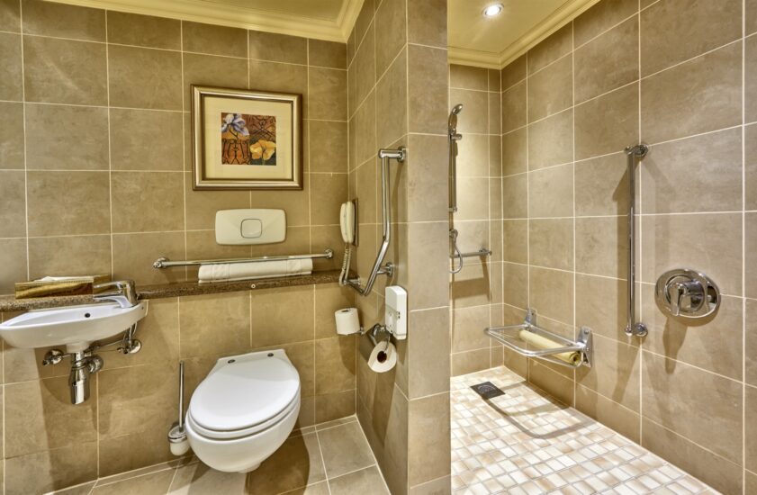Special Assistance bathroom with roll-in shower at the D'oreale Grande