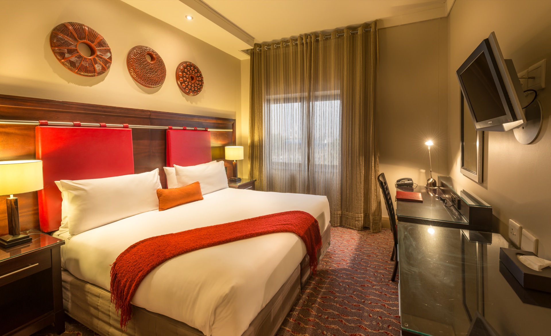 Executive Suite bedroom at Peermont Mondior, a 4-star hotel near OR Tambo airport