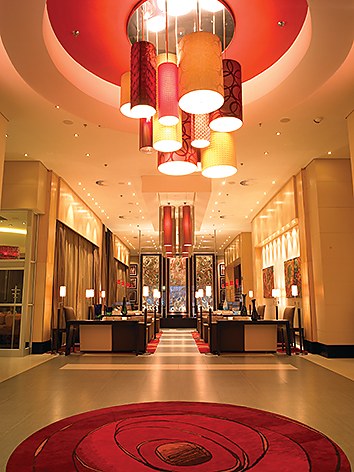 Lobby with colourful pendant lighting at Peermont Mondior
