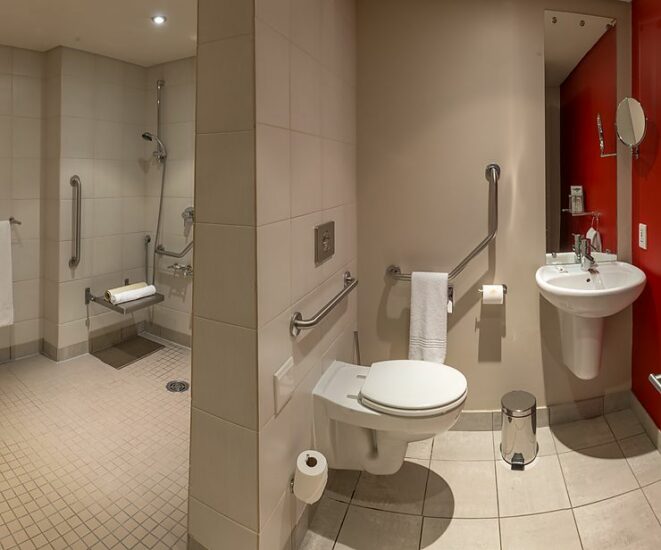 Accessible bathroom with grab rails at Peermont Mondior
